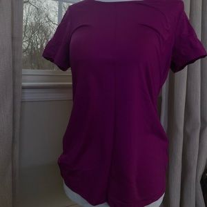 Plain purple short sleeve shirt.